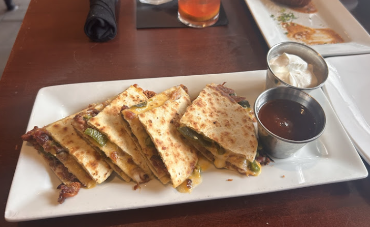 Iron Cactus signature dishes Chicken Quesadilla
Brisket Queso
Mexican Meatloaf